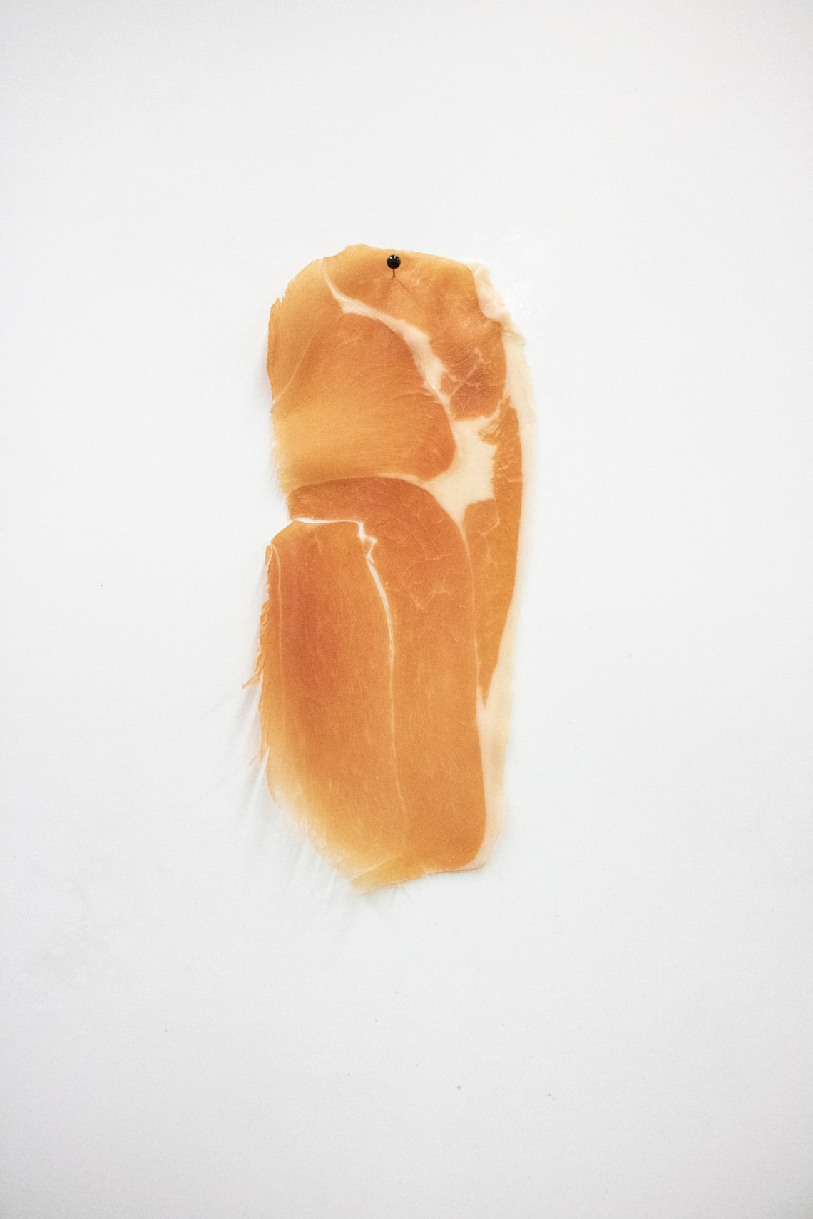  - untitled (prosciutto pinned to the wall slice after slice)